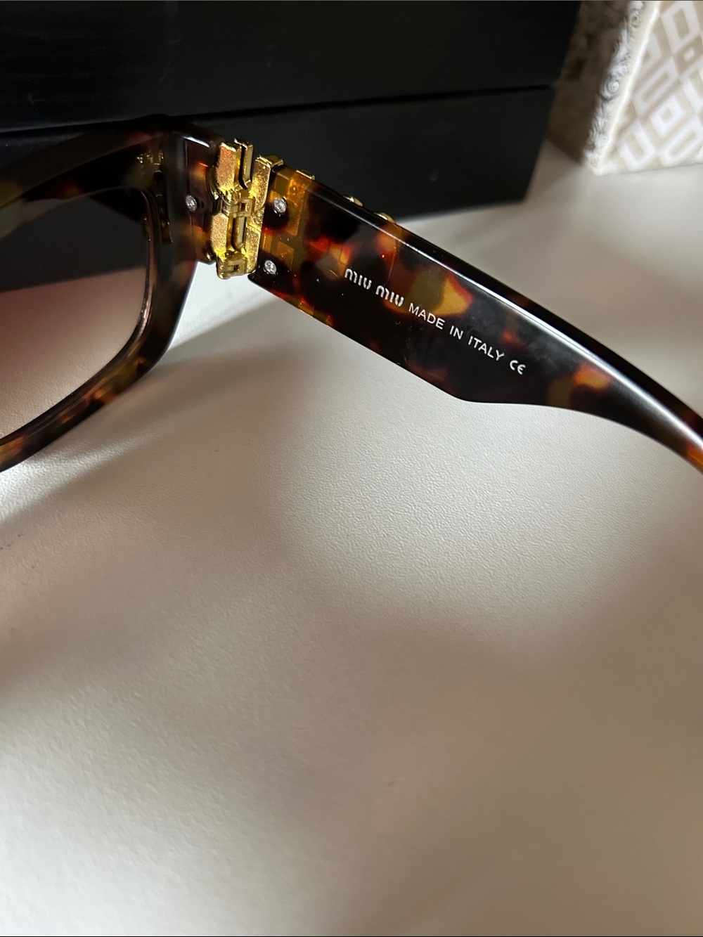 “ Miu Miu” Tortoiseshell Rectangular Sunglasses with Gold Accents - Picture 7 of 9